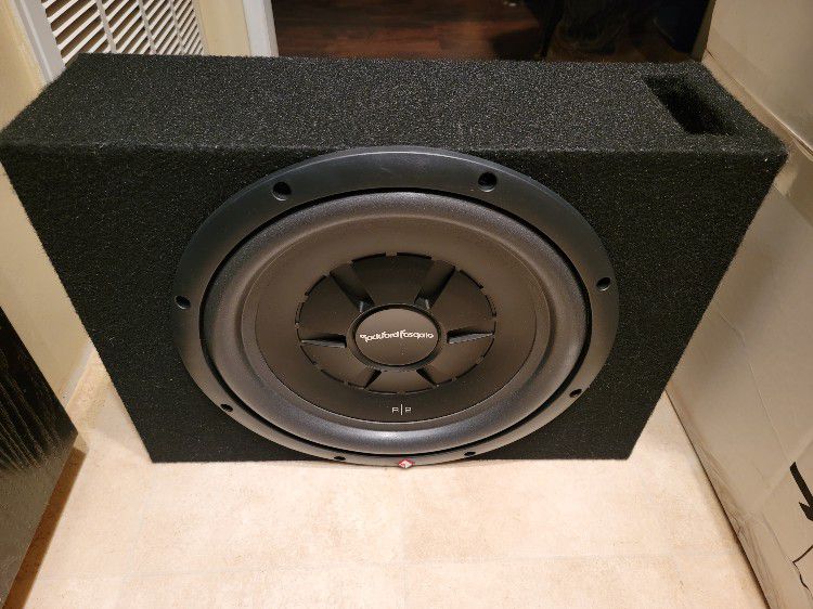 12 Inch Rockford Fosgate Shallow Subwoofer with Crunch amp.