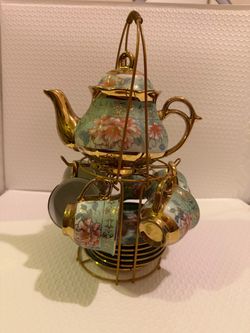 Porcelain Tea Set with Metal Holder ( teapot, 6 tea cups, 6 Cups Saucers )