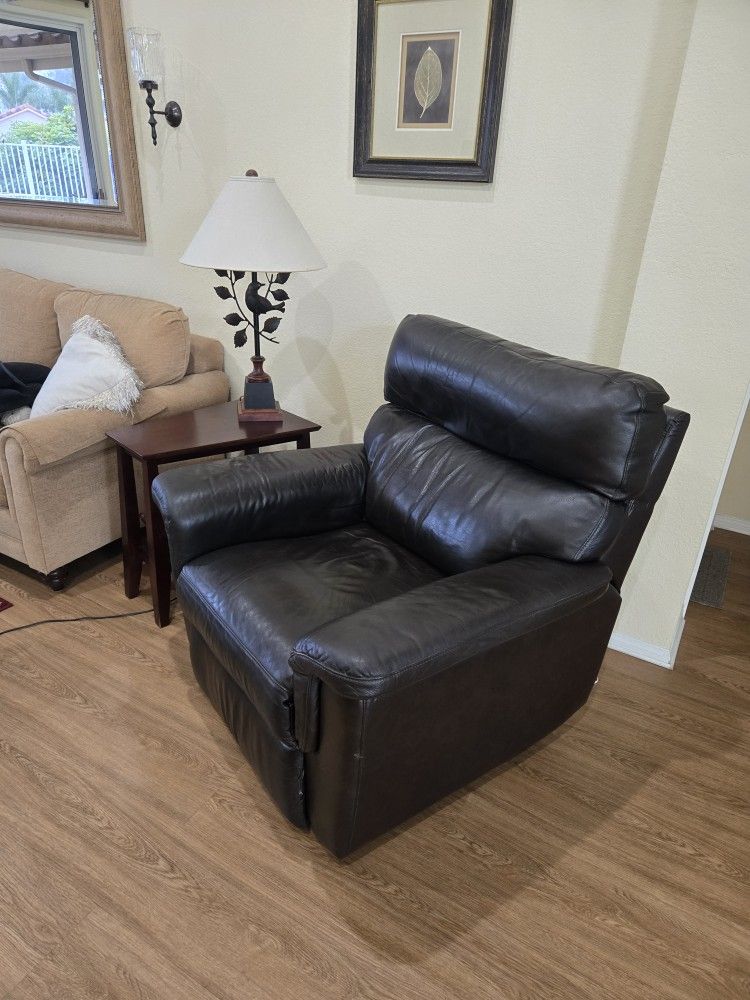 Wall-away Leather recliner. Very comfortable.