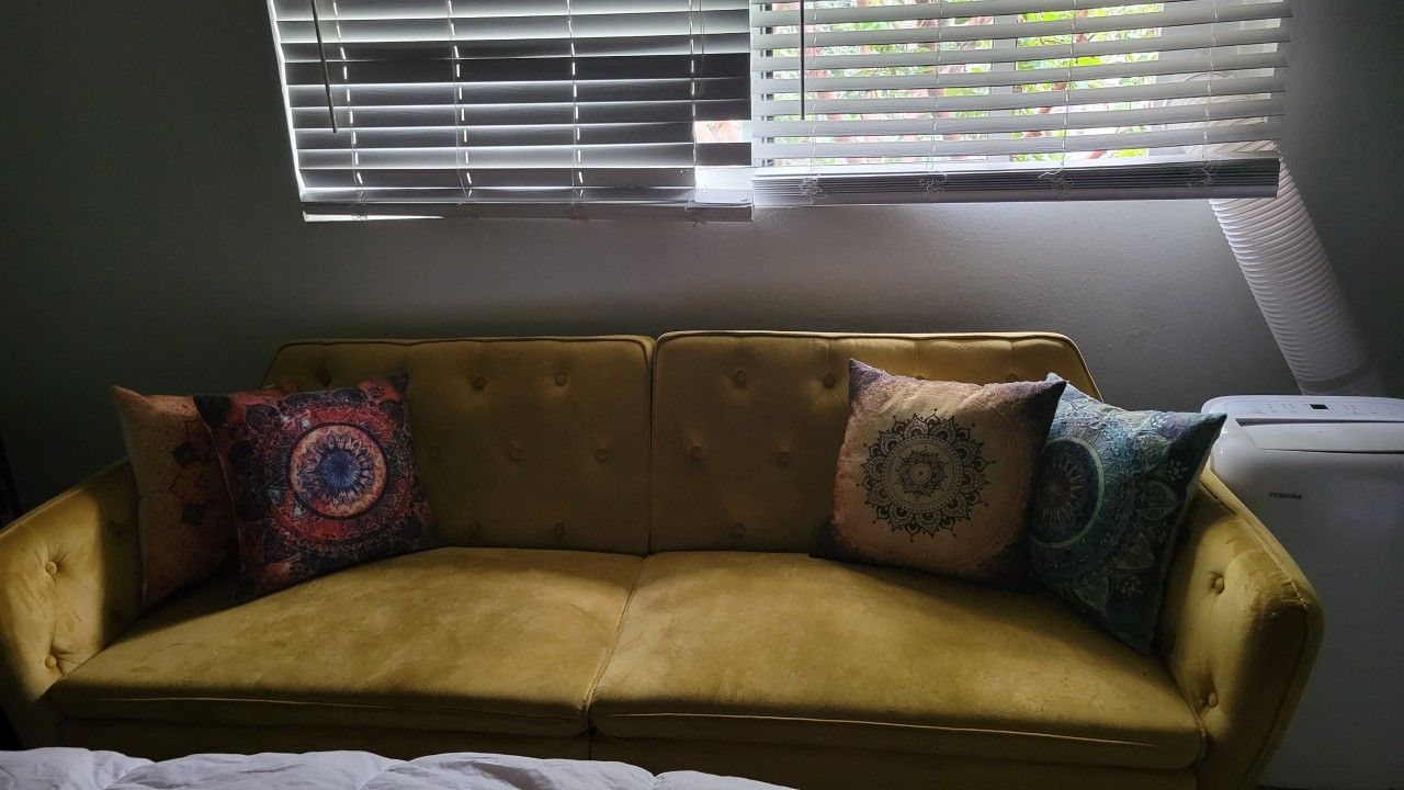 Retro Yellow Couch With Throw Pillows