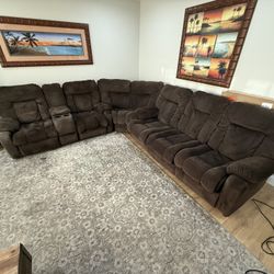 3 piece sectional couch will full size fold out sleeper, 2 power recliners 1 is not working this couch is in a home with dogs  good condition 