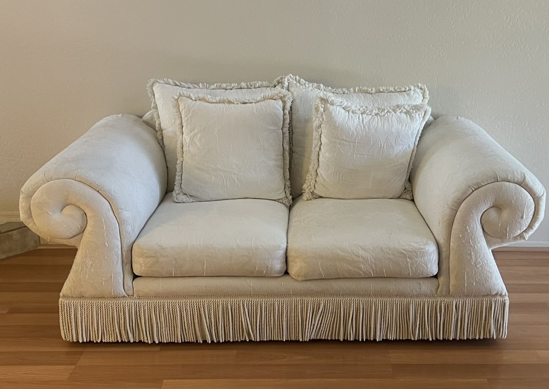 Beautiful White Loveseat Sofa With Fringe Detailing 