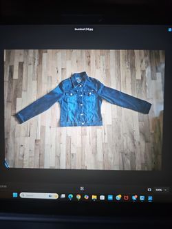 New jean jacket junior medium size for sale.