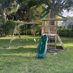 Kids Jungle Gym Playground. Swings, Slide And Climbing Wall