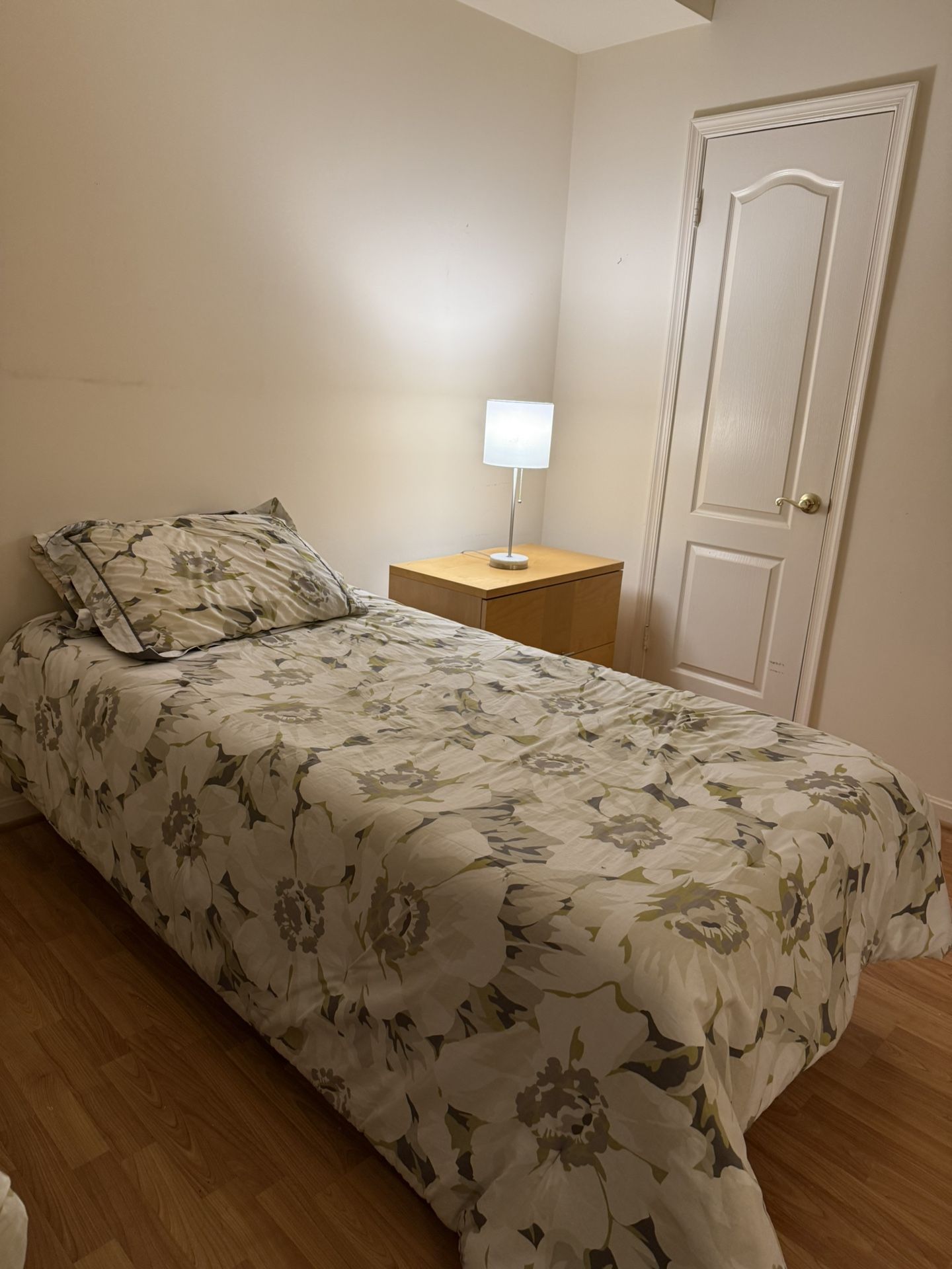 Two Twin Beds With Mattresses And Bedding