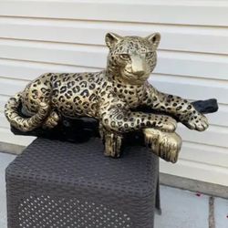 Golden Leopard On A Log Statue