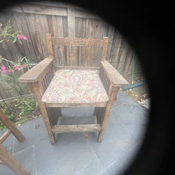 Two wooden stools and a table