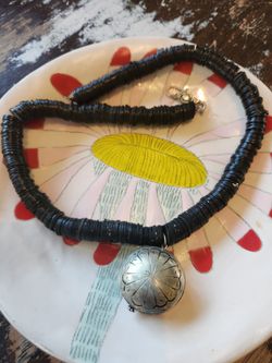 BEAUTIFUL- HANDMADE THAI SILVER PENDANT WITH VERY OLD TRADE COCONUT BEADS