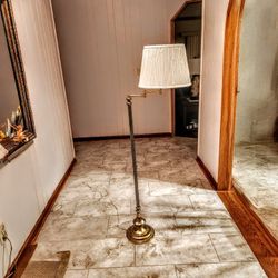 Gold-Colored Floor Lamp With Off-White Shade