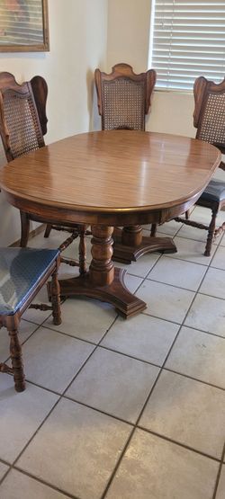 Wood Pedestal Dining Table with 4 Cane Back Chairs