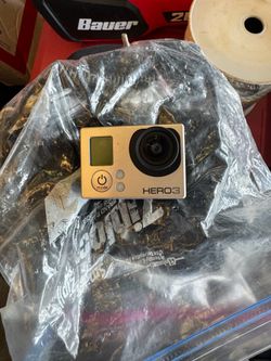 GoPro Hero 3 Action Camera and a whole bag of accessories