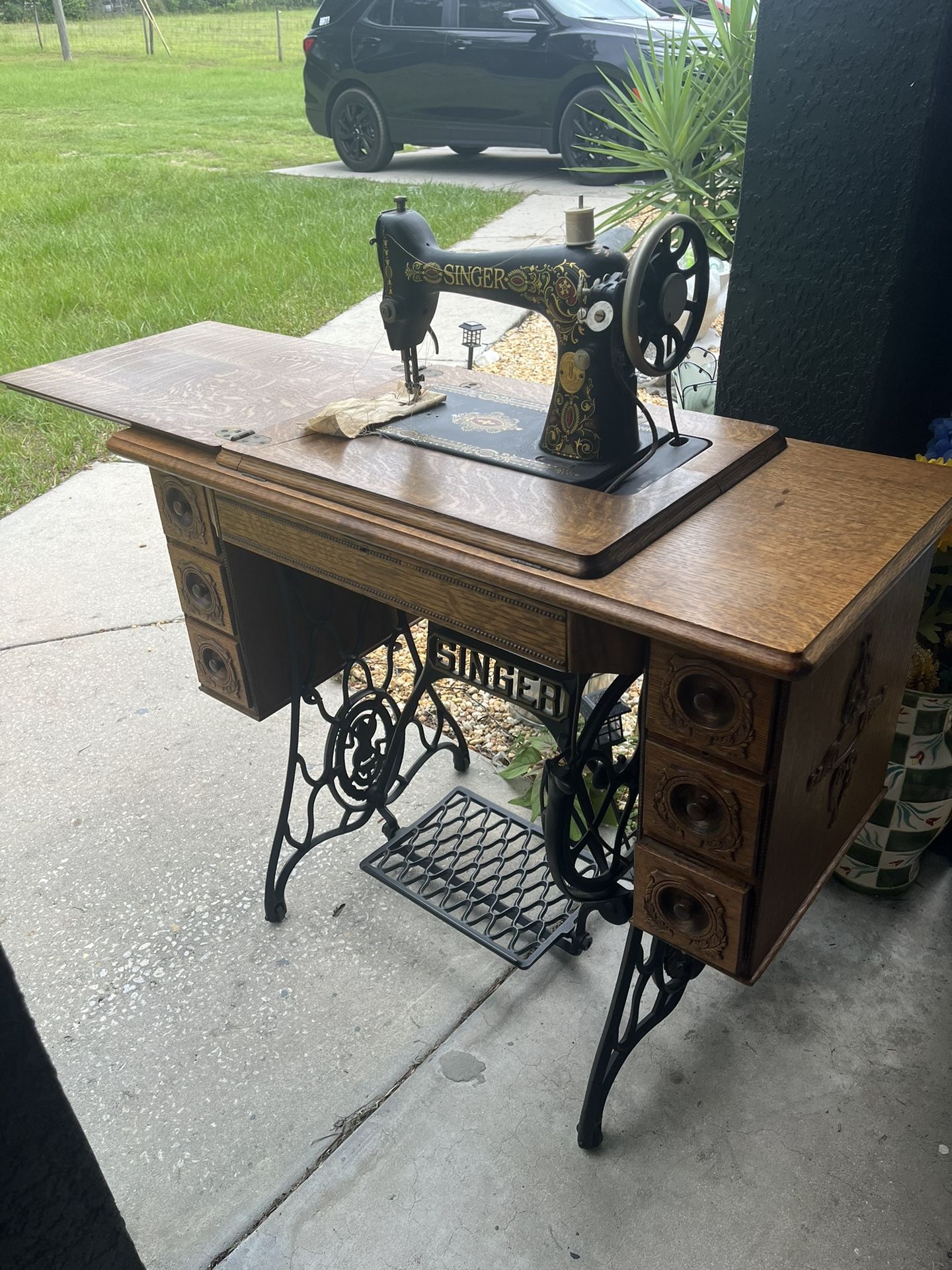 Antique Sewing Machine And Table