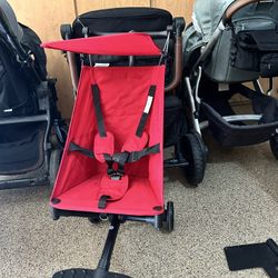 Red Compact Baby Stroller Retails $94