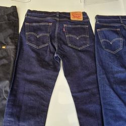 Levi's Jeans And Cat Black Cargo Pants 32x30 Not Used 40.00 All 3