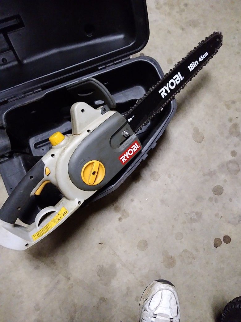RYOIB. 18 INCH ELECTRIC. CHAINSAW. NEW. NEVER USED. 4.5. HP. MOTOR. VERY STRONG. CUTTING SAW