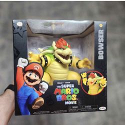 Nintendo the super mario bros movie Bowser figure wuth fire breathing effect