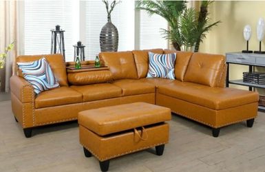 Caramel leather sectional couch with drop down table