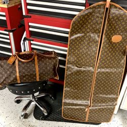 Authentic Louis Vuitton monogram Sac Souple 55 Travel Bag Plus Louis Vuitton Vintage Garment Bag 