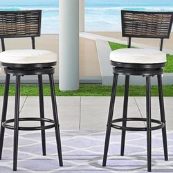2 iron swivel bar stools