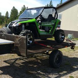 8x10 trailer with 3k axle has 2 spares and 6.5 ft ramp