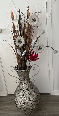 Silver vase with flowers 20.00