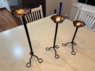 Metal candlesticks/ Candelabros en Metal