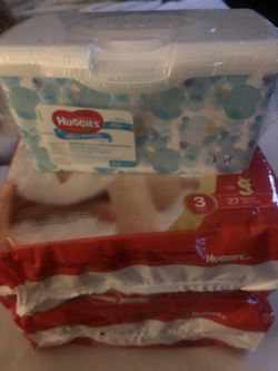 2 packs size 3 Diapers and 1 pack wipes