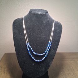 925 Sterling Silver STAMPED On Clasp. Hangs About 12" Its A Southwestern Necklace With Blue Beads