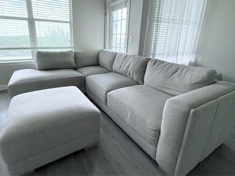 Light Gray L-Shaped Sectional Sofa + Ottoman – Excellent Condition!