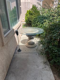 Glass round table with the basin