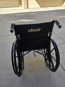 MANUAL WHEEL CHAIR - ALMOST NEW