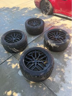 steeda mustang trident satin black rims and nitto nt555 g2