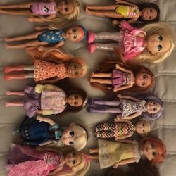 Lot of 50 Barbie’s & Barbie Clothes