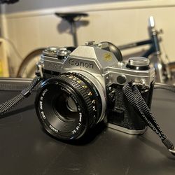 Canon AE-1 Film 35mm Camera With 50mm F/1.8 Lens Working Great