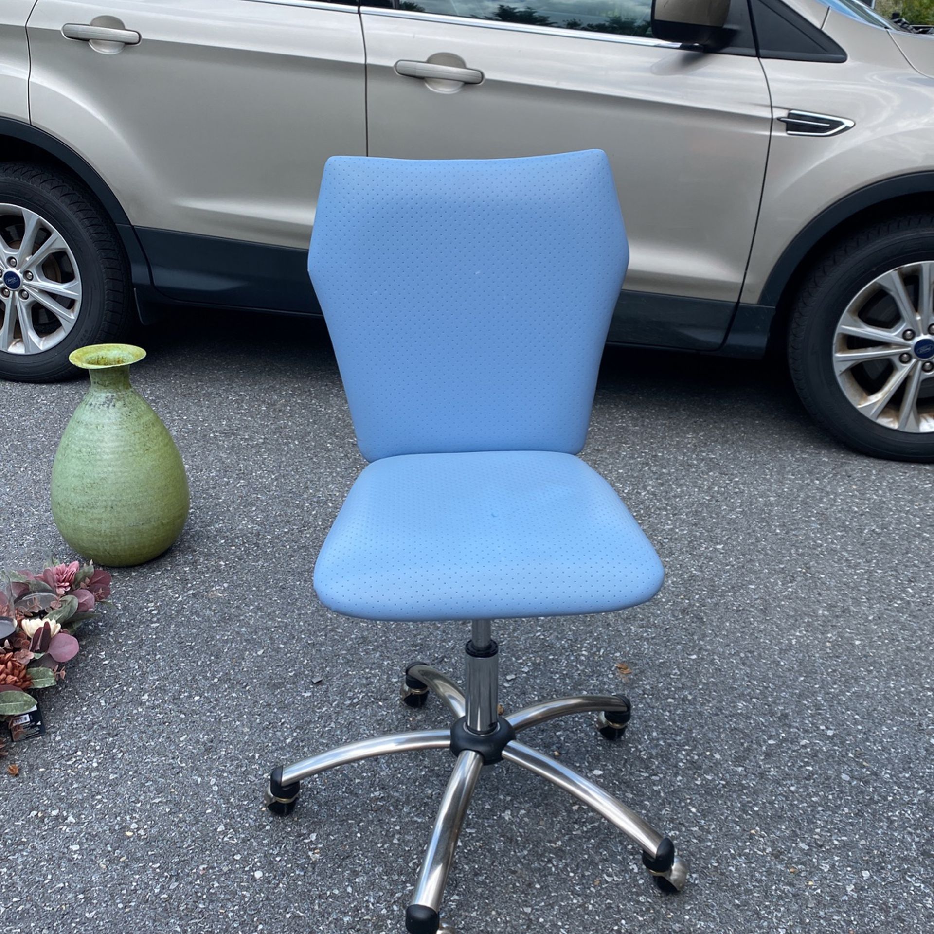 Blue Rolling Office Chair.  