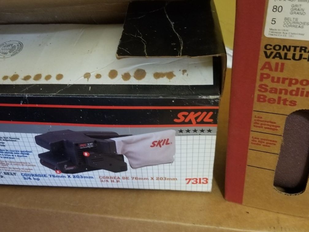 Sander with extra sandpaper