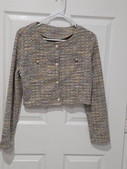 Blue checked tweed. Size LP. It’s pre-owned but still looks great.