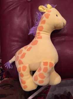 Giraffe stuffed animal with rattle inside