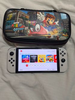 Nintendo Switch OLED with Carrying Case with charging cord