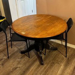 Wood Table And Plastic Chairs 
