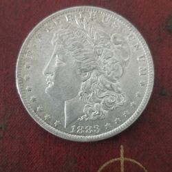 1883-O marked Morgan Silver Dollar