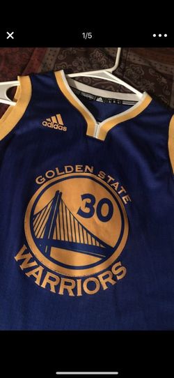 Size large in boys/teen practically brand new curry jersey