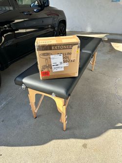 Massage table with rolling stool