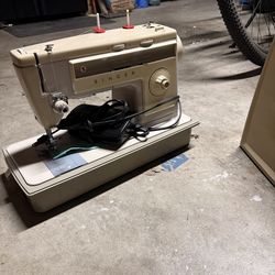 Vintage Singer sower