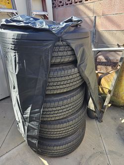 245 75 R17 tires and original rims (5 total)