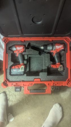Milwaukee 1/2 Hammer drill Fuel and impact driver with case one battery
