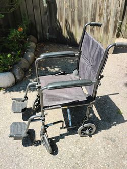 Transport wheelchair