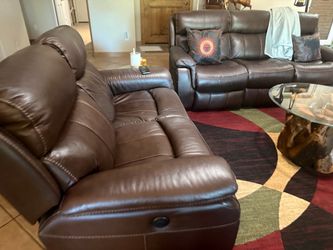 Three electric sofas loveseats and recliners Ashley’s