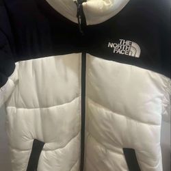 The North Face white and black puffer jacket