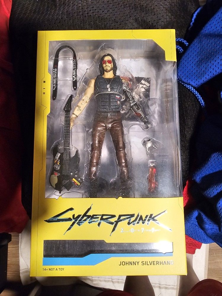 7-inch scale action figure of the character Johnny Silverhand from the video game Cyberpunk 2077